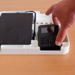 Payment terminal being placed into an enclosure